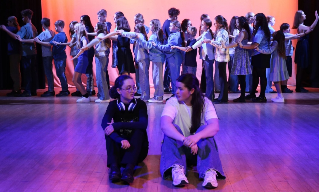 Group of pupils performing at House Performing Arts on stage